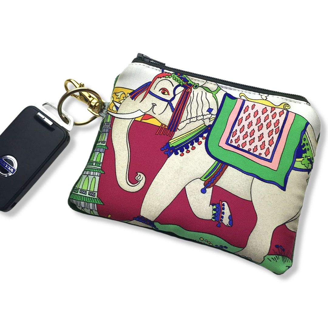 Vintage Hermes keychain bag Fantasies Indienne Vintage Coffee Run Keychain Bag at Vintage Luxe Up