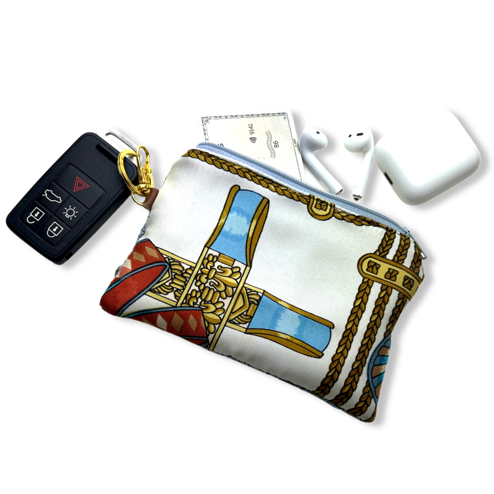 Vintage Hermes keychain bag Rubans du Cheval Turquoise Vintage Scarf Coffee Keychain Bag at Vintage Luxe Up