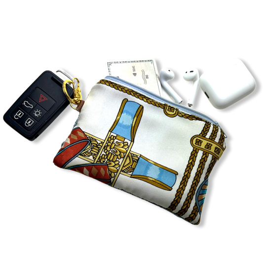 Vintage Hermes keychain bag Rubans du Cheval Turquoise Vintage Scarf Coffee Keychain Bag at Vintage Luxe Up